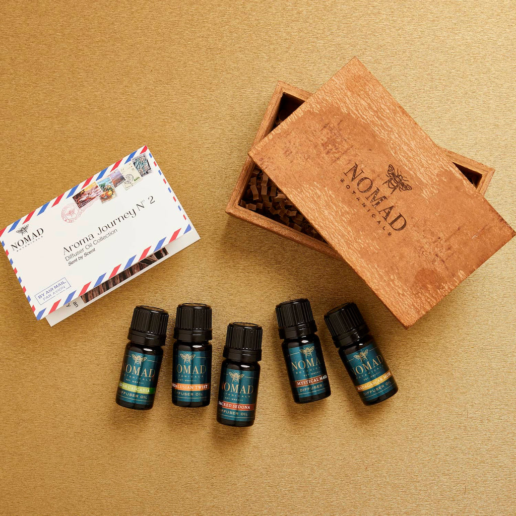 Picture of Aroma Journey 2 Collection with 5 essential oil blends in Cinnamon Box with brochure