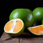 Green Mandarin Essential Oil orange and green fruit